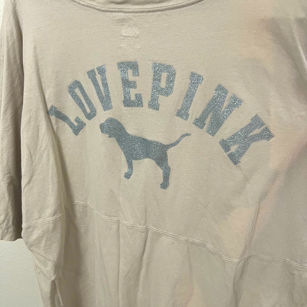 Victoria’s Secret pink shirt